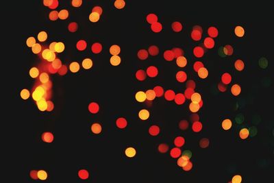 Defocused image of illuminated lights at night