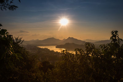 Scenic view of mountains against sky during sunset