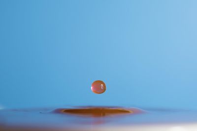 Close-up of water against blue sky