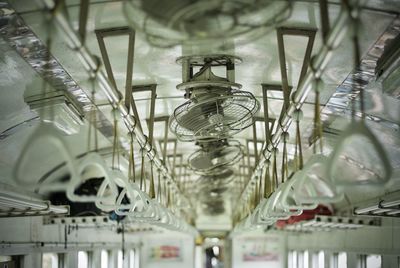 Low angle view of fans in train