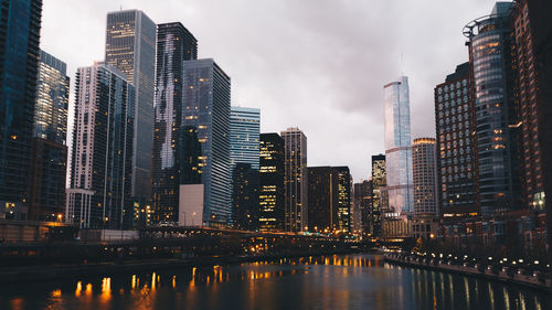 Low angle view of skyscrapers lit up at night