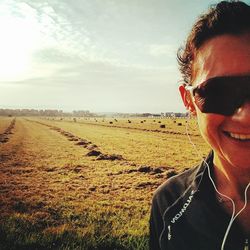 Portrait of young woman in field