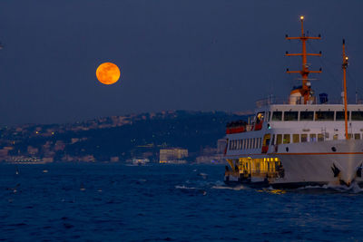 Scenic view of sea against sky at night