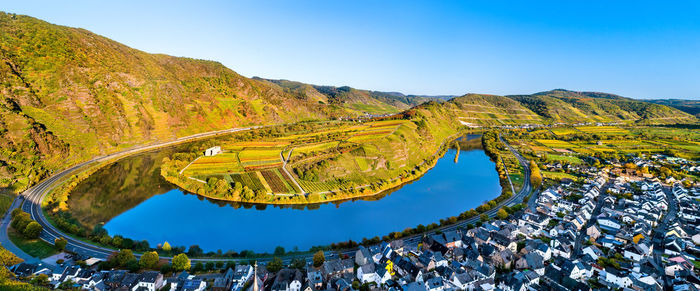 High angle view of landscape against blue sky