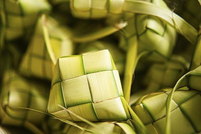 A bunch of ketupat, traditional malay cuisine made with coconut leaves during the eid celebration