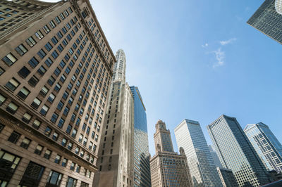 Low angle view of skyscrapers against sky