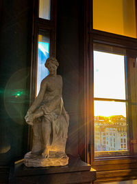 Sunlight streaming through window in historic building