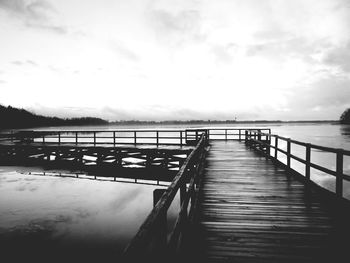 Pier over sea against sky