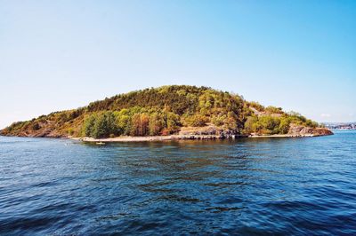 Scenic view of sea against clear sky