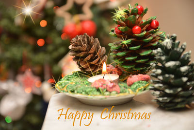 Close-up of christmas decorations on table