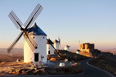 Traditional windmill against clear sky