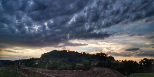 Scenic view of dramatic sky during sunset