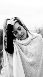 Close-up of young woman in snow