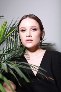 Portrait of young woman looking away