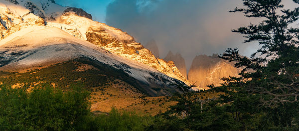 Scenic view of mountains against sky during sunset