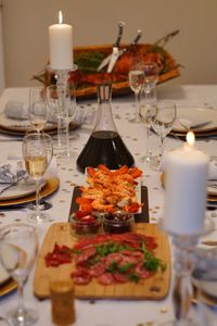 Close-up of wine glasses on table