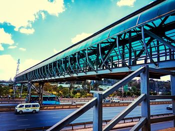 Bridge over road against sky