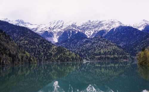 Scenic view of lake with mountains in background