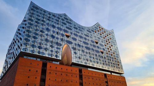 Low angle view of modern buildings against sky