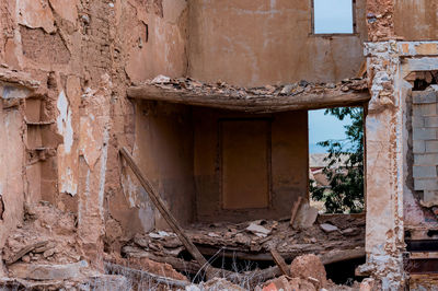 Broken window of old abandoned house