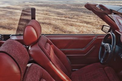 Close-up of seat on beach
