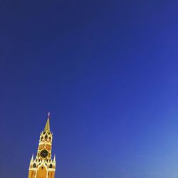 Low angle view of building against blue sky