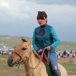 Woman riding horse