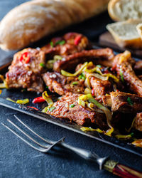 Close-up of meat on barbecue grill