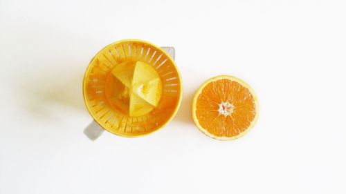 Directly above shot of oranges against white background