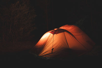 General view of a tent illuminated at night