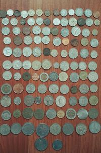 High angle view of coins on table