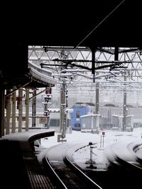 Train on railroad tracks during winter