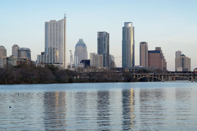 River by city against clear sky