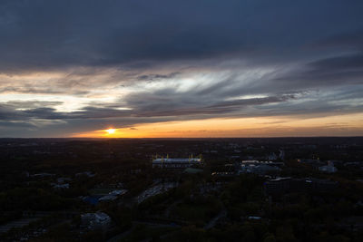 High angle view of buildings against sky during sunset