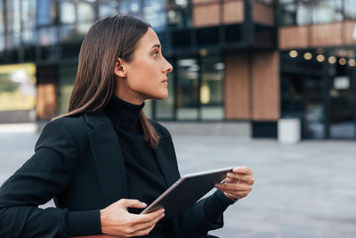 Young woman using mobile phone