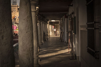 Man walking in corridor