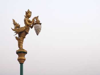 Low angle view of statue against clear sky