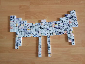 High angle view of text on hardwood floor