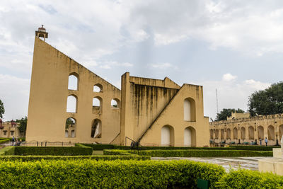 View of historical building against cloudy sky