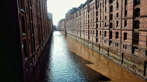 View of canal along buildings