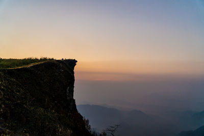 Scenic view of silhouette mountain against sky during sunset