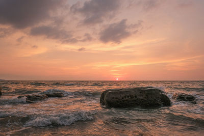 Scenic view of sea against sky during sunset