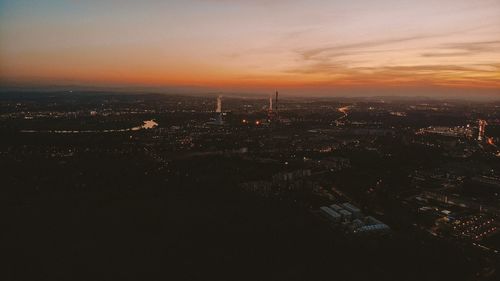 High angle view of city during sunset