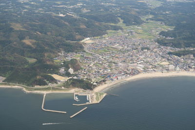 High angle view of sea seen through airplane window