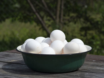 Close-up of eggs in bowl on table