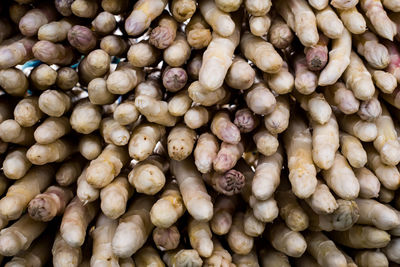 Full frame shot of onions for sale at market stall