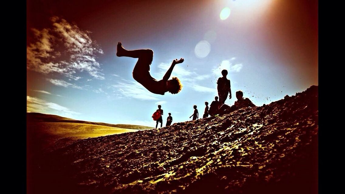 PEOPLE ENJOYING AT THE SHORE