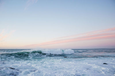 Scenic view of sea against clear sky during sunset