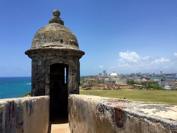 Ancient structure against blue sky