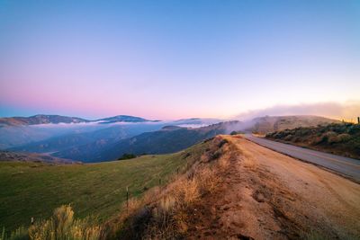 Scenic view of mountains against sky during sunset